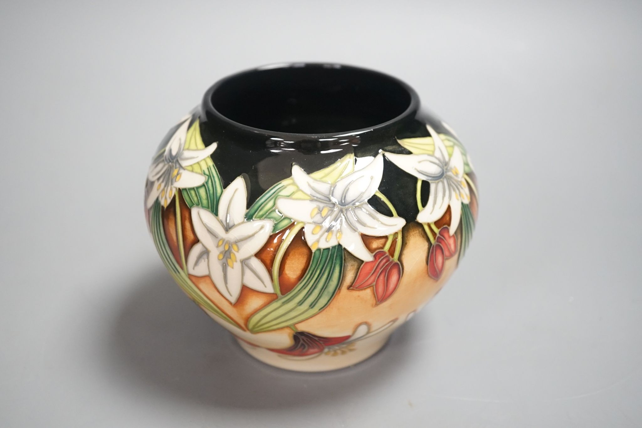 A Moorcroft squat limited edition vase signed Angi Davenport, 11 cms high.